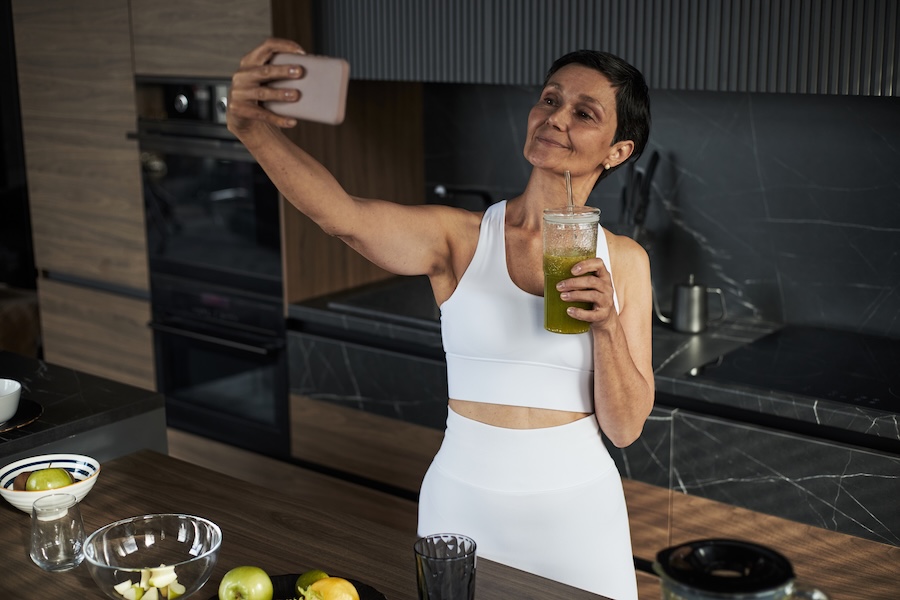 middle aged caucasian woman taking selfie while dr 2025 09 09 19 09 55 utc